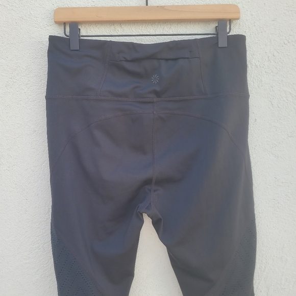 Athleta black mesh panels zipper pocket work out pants size L - Picture 10 of 12